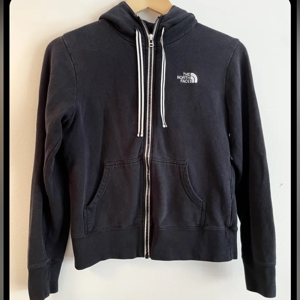 NORTHFACE BLACK ZIPUP HOODIE.Warm, trendy, women’s jacket w/ hood.Thick quality